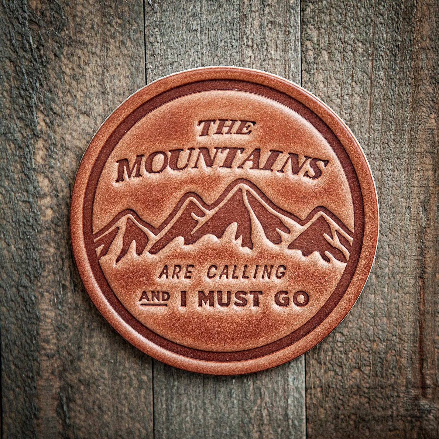 The Mountains Are Calling Leather Coaster