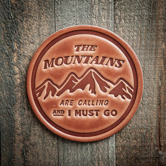 The Mountains Are Calling Leather Coaster